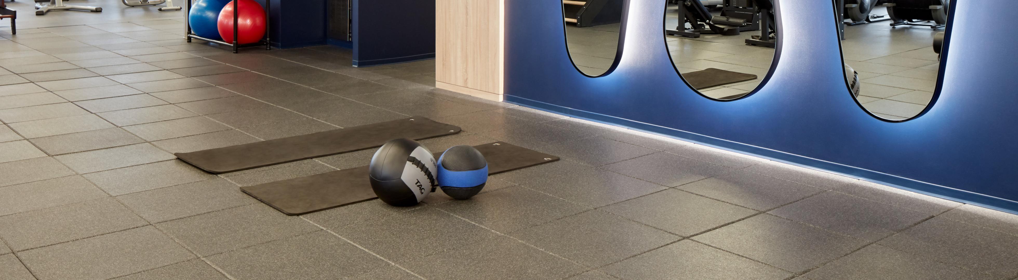 A fitness center in a hotel with ECOdB